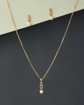 A cute pendant matched with golden polish chain with matching earrings.