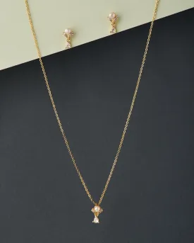 A cute pendant matched with golden polish chain with matching earrings.