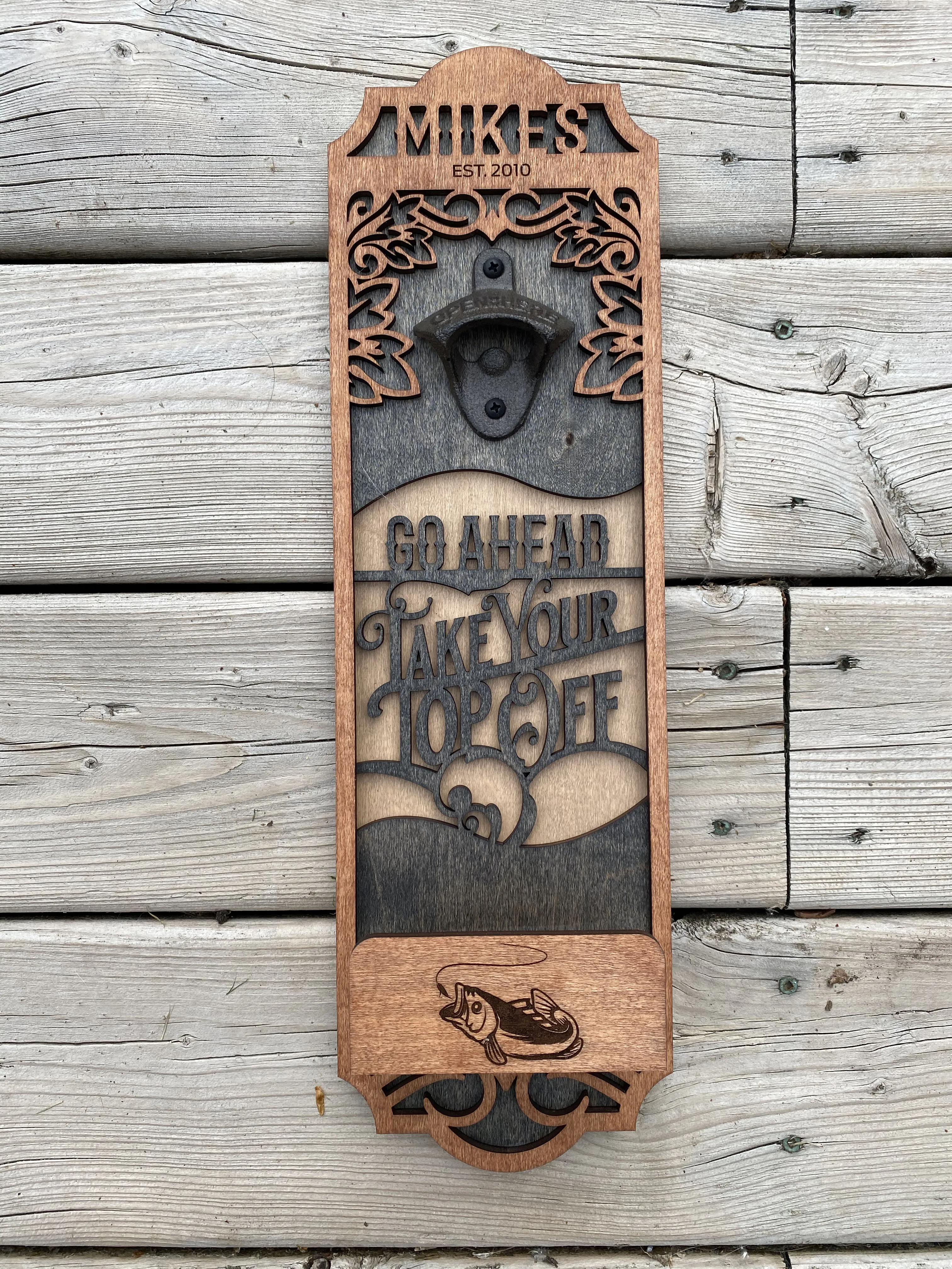 Unique hanging bottle opener